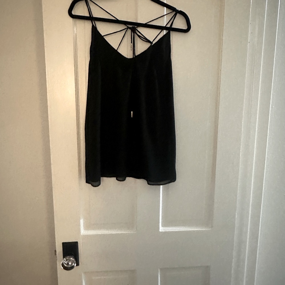 Black tank size S w/ tie back detail.